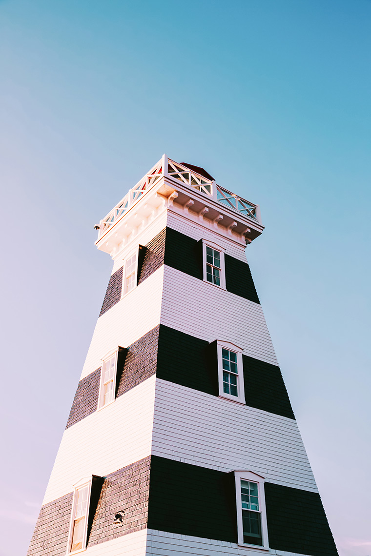 Black and white striped lighthouse in West Point, PEI